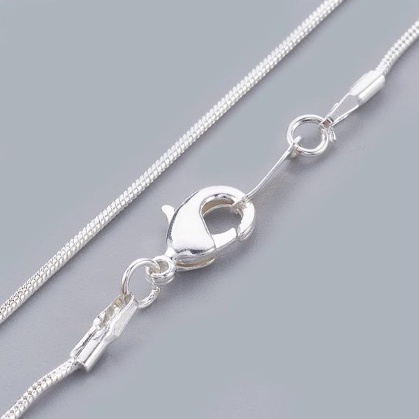 10. Silverpläterad ormlänk kedjor1,2 mm. breda c:a 43 cm.långa