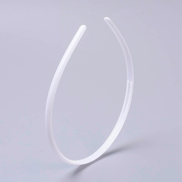 Vit  taggat  plast diadem 8 mm. bred
