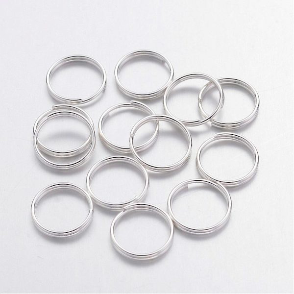 20 gr.(Drygt 240 st)Dubbla säkerhetsringar 7 mm. i ytterdiameter 1 Silver