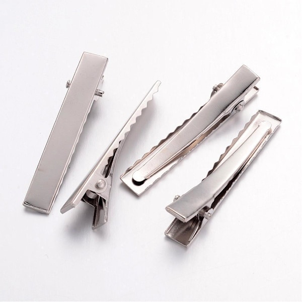 24 stk sølvfargede hårklemmer 3,4 cm lange og 8 mm brede