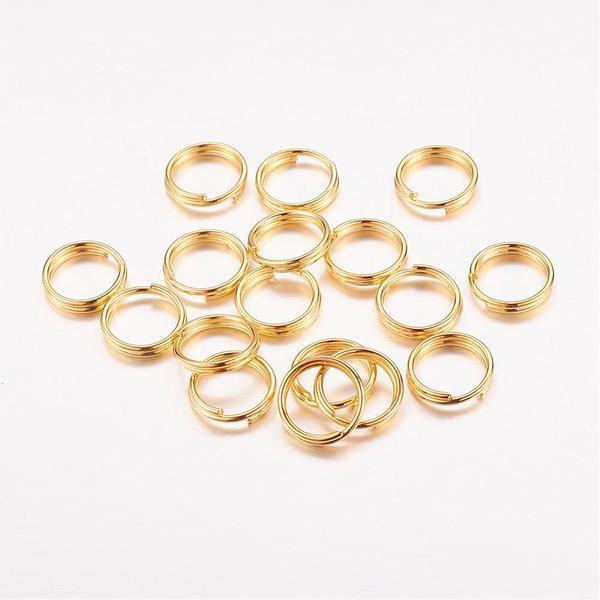 20 gr.(Drygt 240 st)Dubbla säkerhetsringar 7 mm. i ytterdiameter 1 Silver