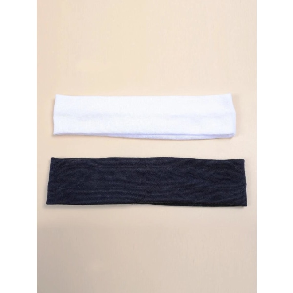 2 joustavaa hiusnauhaa polyesteriä C:a 5-6 x 20 cm- 1 musta 1 valkoinen