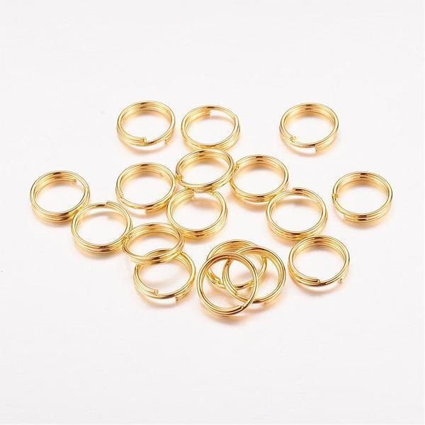10 gr.(Drygt 120 st)Dubbla säkerhetsringar 7 mm. i ytterdiameter 1 Silver