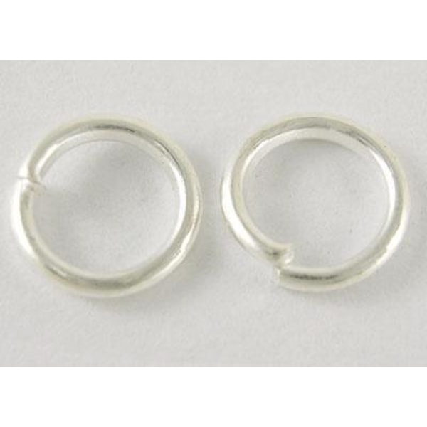 20 gr. (c:a 240 st.) Silverpläterade motringar  Ø 8 mm.