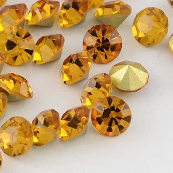 100 Topaz koniska Swarovski kristaller för inlägg Ø 3,4 mm(PP27)