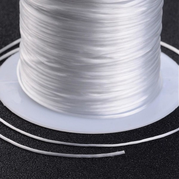 2 Rullar  10 mt. vit transparent elastisk tråd 0,8 mm. Ø