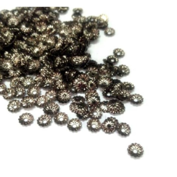 Hieman yli 440 nikkelitöntä musta helmikorkkia Ø 5 mm.