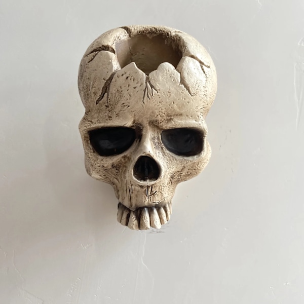 Luova kauhu-luuranko-kynttilänjalka Halloween-koristeeksi skull