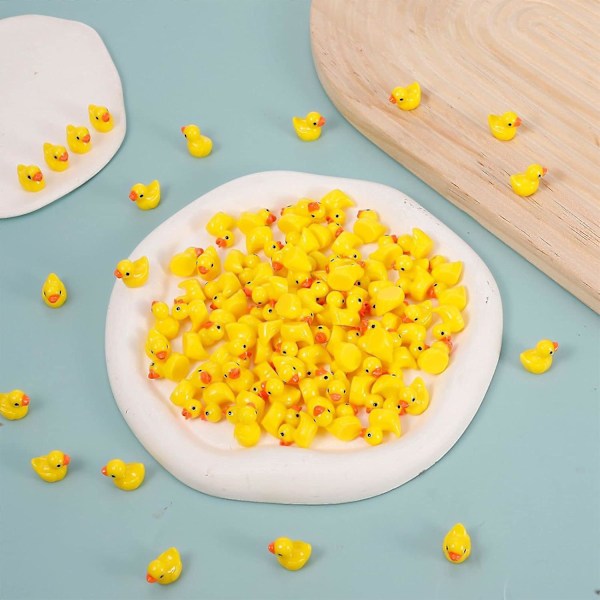 Paketti, jossa 100 mini ankkafiguuria, miniankkoja hartsi pieniä ankkoja, ankka minieläinfiguureja akvaarioon Pienoispuutarhafiguurit koristelu (keltainen){EE}