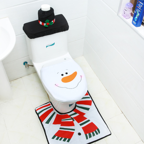 Juletoaletttrekk Eldre snømann Toalettsetetrekk Gulvmatte Vanntanktrekk Tissuetrekk tredelt sett Snowman