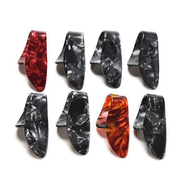 Finger- och tumm-gitarrplockar i celluloid