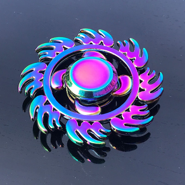 Metallivärinen metalliseos sormenpää Gyro-sormi Pyörivä sormi Hyödyllinen työkalu paineen vähentämiseen Colorful Magic Dragon 101