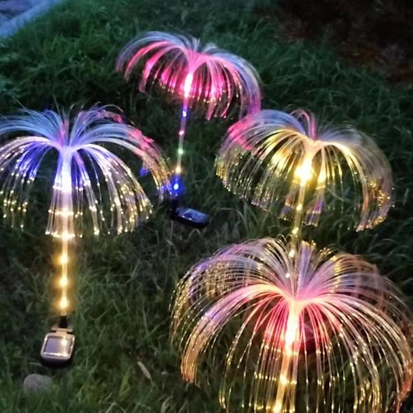 Aurinkoenergialla toimiva seitsemänvärinen optinen kuitu LED-nurmikkolaite warm