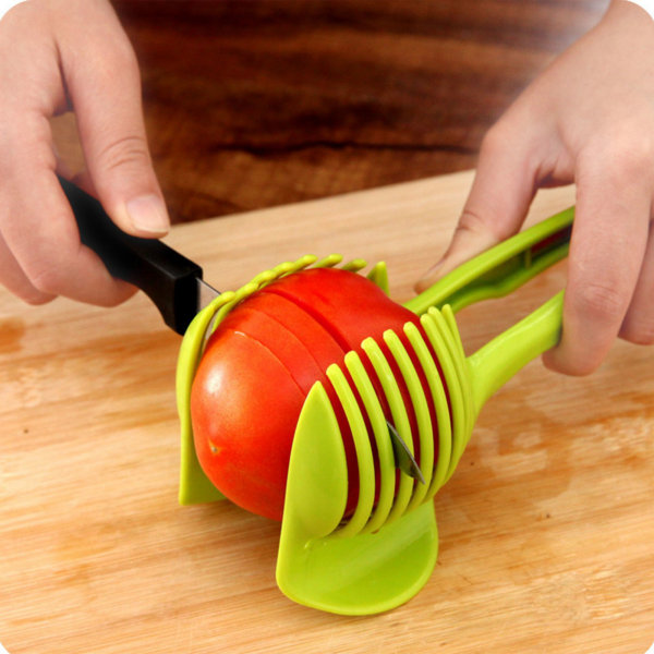 Tomaattien viipalointipidike ABS-monikäyttöinen kädessä pidettävä pyöreä hedelmäpihdit sipulipidike Keittiön leikkausapuvälineet työkalu sitruunamunan vihanneksille