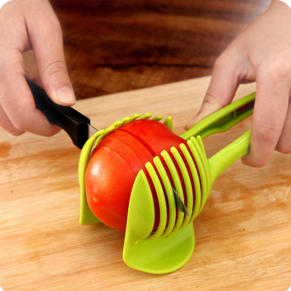 Tomatskjærerholder ABS Multifunksjonell Håndholdt Rund Frukt Tang Løk Holder Kjøkken Skjæring Hjelpemiddel Gadgets Verktøy for Sitron Egg Grønnsaker