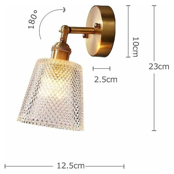 Modern vägglampa i glaskula och mässing