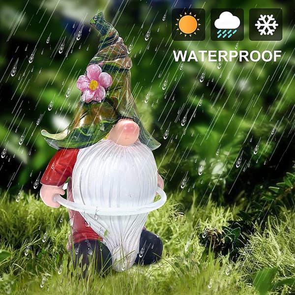 Solcellsbelyst trädgårdstomte med LED-solcellsdriven syntetisk hartsgnome med solceller