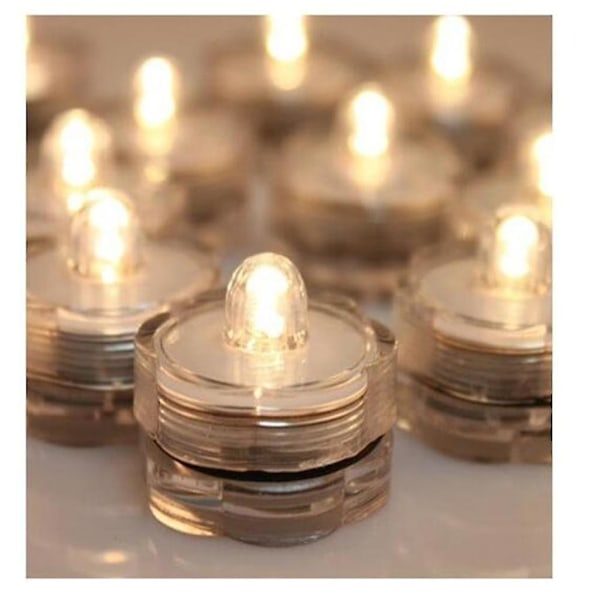 12x LED Vattentäta Nedsänkbara Tealights Flamlösa Tealight Batteridrivna Bottenlampor För Bröllop Jul