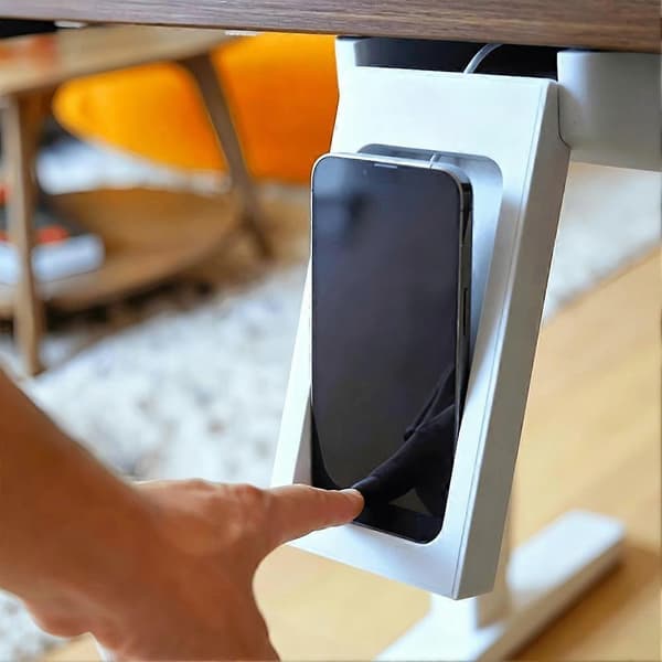 Dolt telefonfäste för montering under skrivbord med push-to-eject och laddningsfunktion