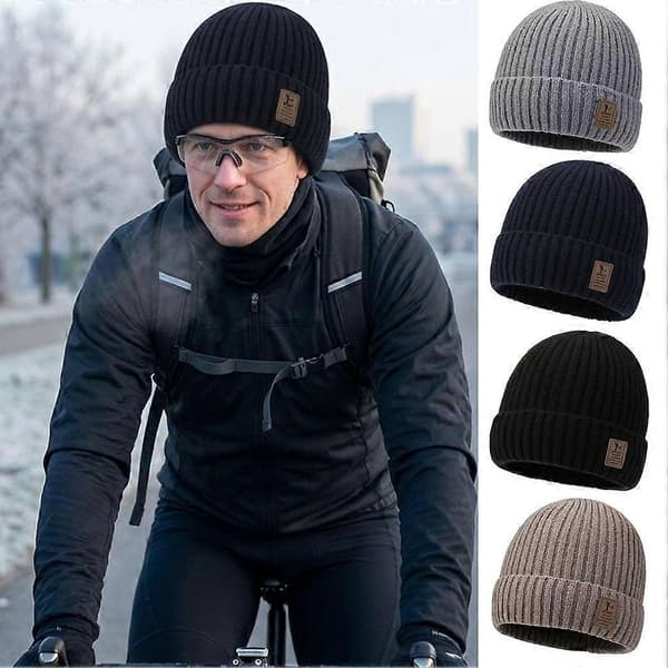 Stickad mössa i polyester med vindtätt skydd och dubbelt lager ribbstickning som blockerar kalla vindar Gray