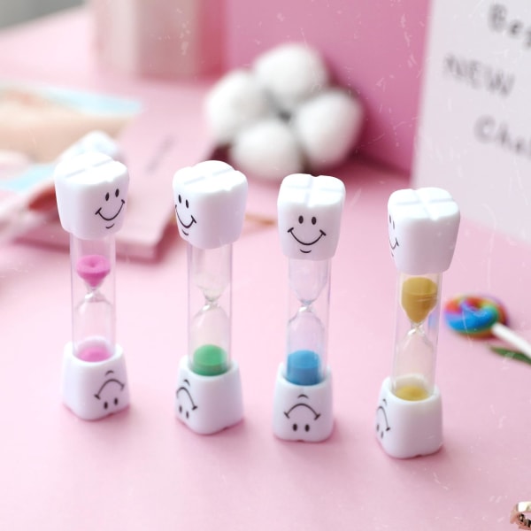 Pakkauksessa 4 lasten hammashiekkaajastinta hampaiden harjaukseen, 3 minuutin tiimalasi vaaleanpunaisena, vihreänä, sinisenä ja keltaisena