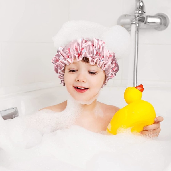 2 pakke vanntette gjenbrukbare dusjhetter for barn i rosa og lilla - egnet for gutter og jenter