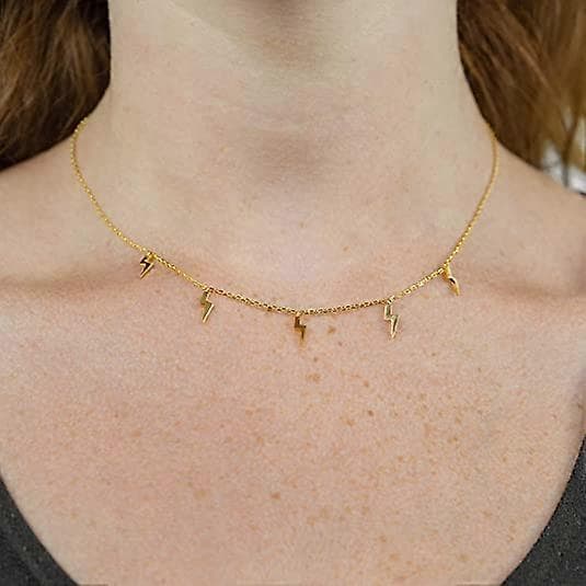 Rodiumpläterat halsband med berlocker