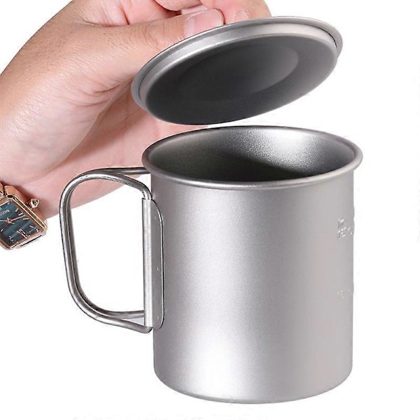Utomhusmugg i ren titan med fällbart handtag
