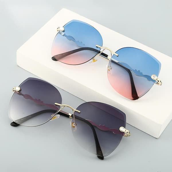 Retro firkantede rimless solbriller for kvinner UV400