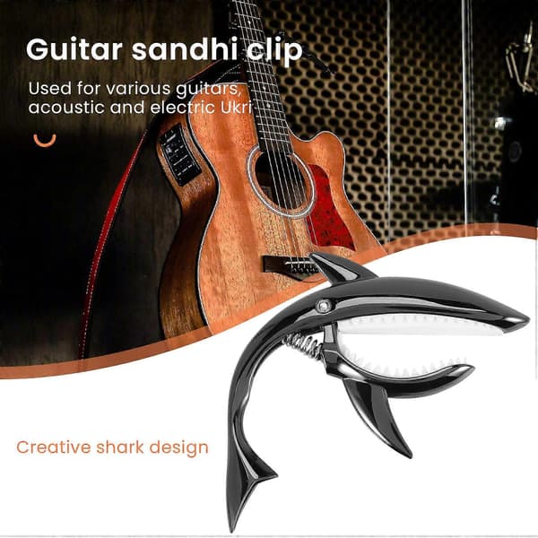Gitarrkapo i zinklegering för akustiska, elektriska, klassiska gitarrer, bas och ukulele, med plektrum