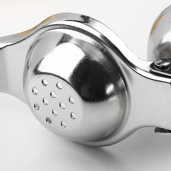 Stor citronpress Klassisk silverfärg, tillverkad av högt resistent polerat rostfritt stål