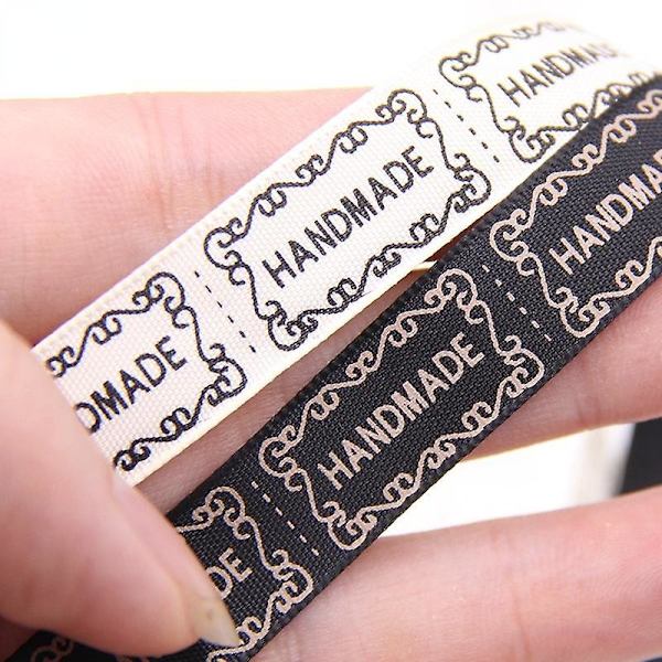 12mm Bredd 5yard/lot Beige / Svart Tryckt Handgjort Designband För Bröllop DIY Hantverk Presentförpackning Bälte & Sytillbehör