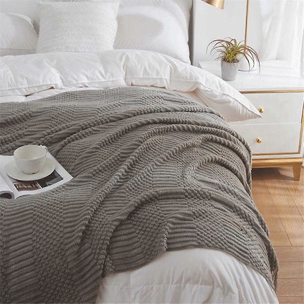 Strikket pledd for sofa, seng og divan Supermykt pledd med dusker Koselig hjemmeinnredning Gul