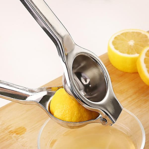 Stor citronpress Klassisk silverfärg, tillverkad av högt resistent polerat rostfritt stål