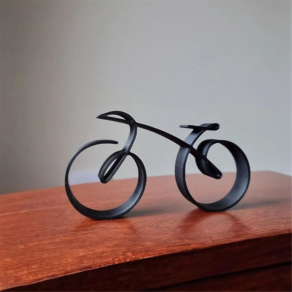Minimalistisk cykelskulptur trådrammestil, minimalistisk cykelstøbejernskunstskulptur, retro