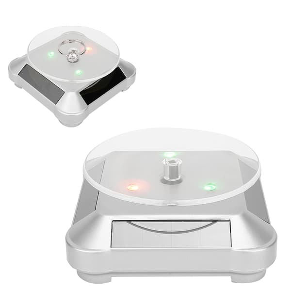 Soldrivet roterande LED-displayställ för smycken och telefoner, silver med ljus