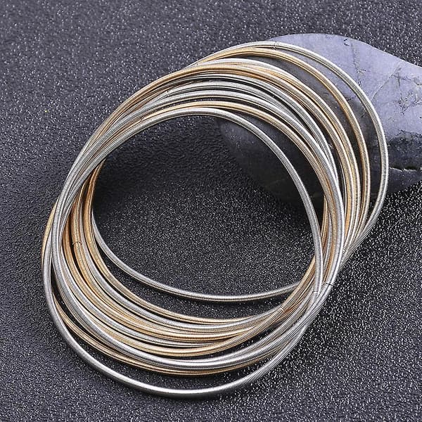 Hopfällbart armband i kolstål, stapelbart, gitarrsträngsfjäderarmband