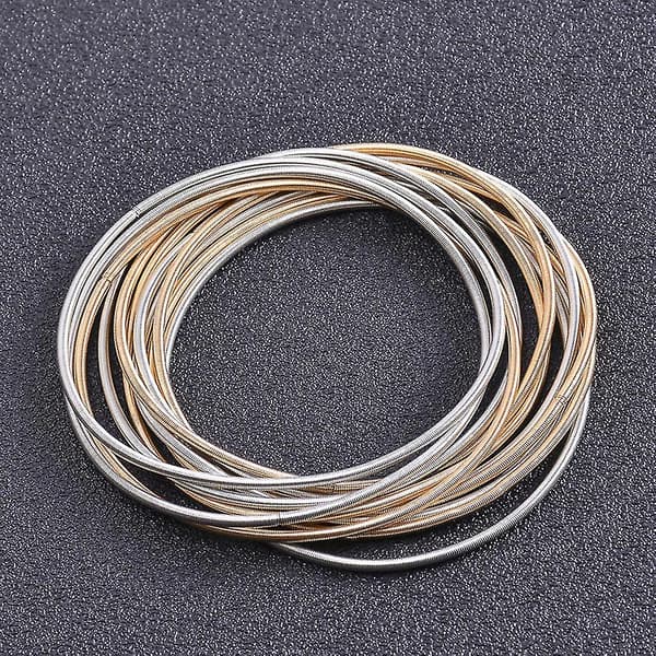 Hopfällbart armband i kolstål, stapelbart, gitarrsträngsfjäderarmband
