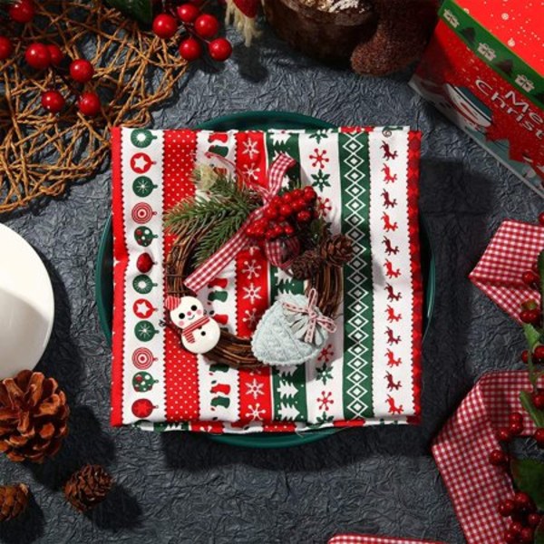 Jouluinen puuvillakangasnippu, 10 kappaletta jouluaiheista kangasta Joulun rasvakauden sarjakuva tikattua puuvillaa