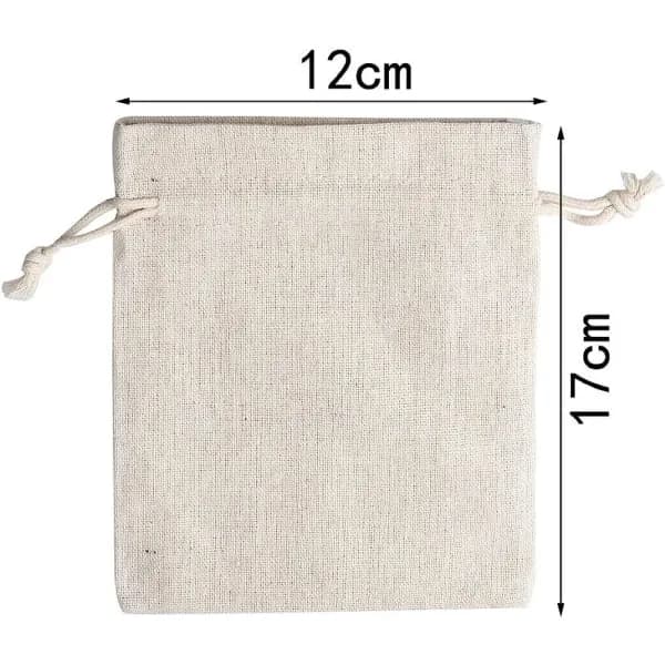 12-pack små bomullspåsar, beige, med dragsko.