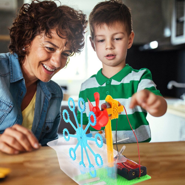 Käsintehty käsin käännetty kuplakone, joka kehittää älykkyyttä Käytännön kykyjä Tieteellisen kokeen tee-se-itse-lelu lapsille