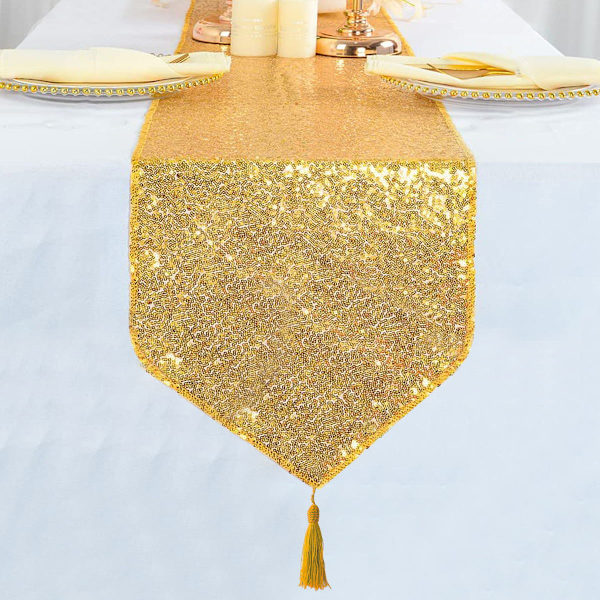 Bordlöpare i guld med fransar och paljetter