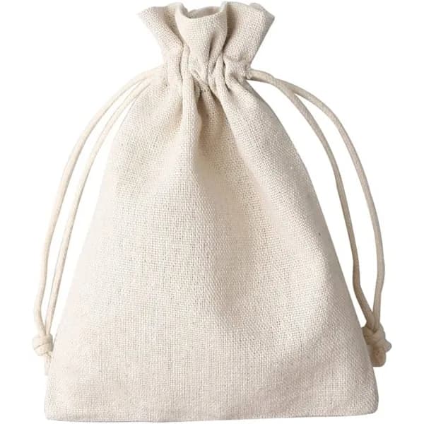 12-pack små bomullspåsar, beige, med dragsko.