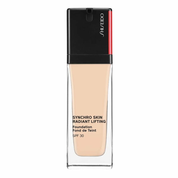 Flytande makeupbas Shiseido Skin Radiant Lifting Nº 130 Opal Spf 30 30 ml