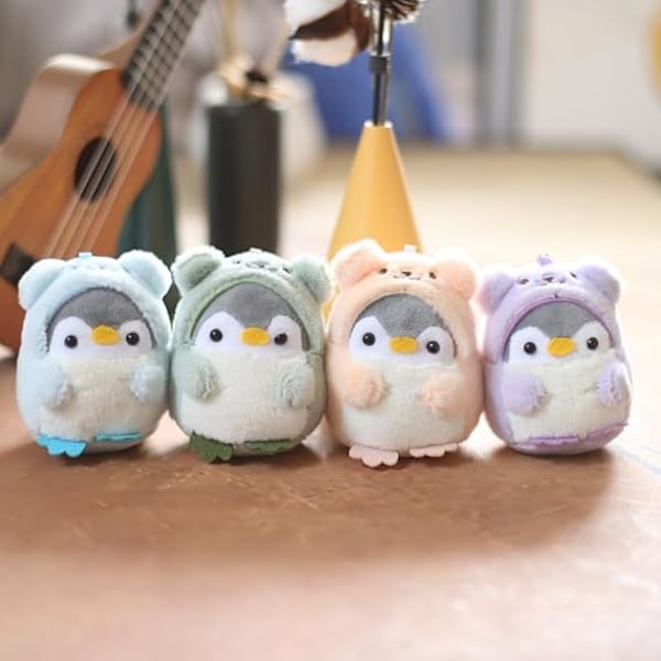 Super söt Kawaii klädd i kläder Cosplay mjuk plysch pingvin nyckelring pojkar flickor hänge metall nyckelring nyckelring, lila