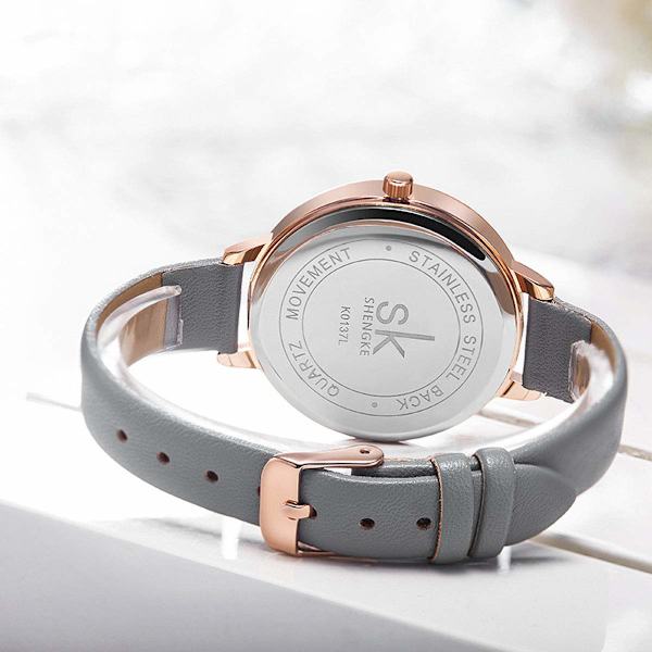 Minimalistisk dameklokke ultra-flat elegant