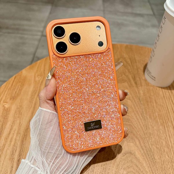 Kotelo iPhone 15 Plus -puhelimelle, ylelliset täysstrassitimantit, oranssi