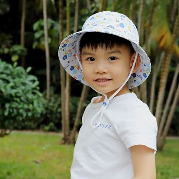 Solhatt, Toddler Bucket Hat, Barnens Sommarfiskarhattar för Spädbarn Pojkar Flickor, Bredbrättad Strandkeps Fiskarhatt med Hakrem White Flower 4-8Years