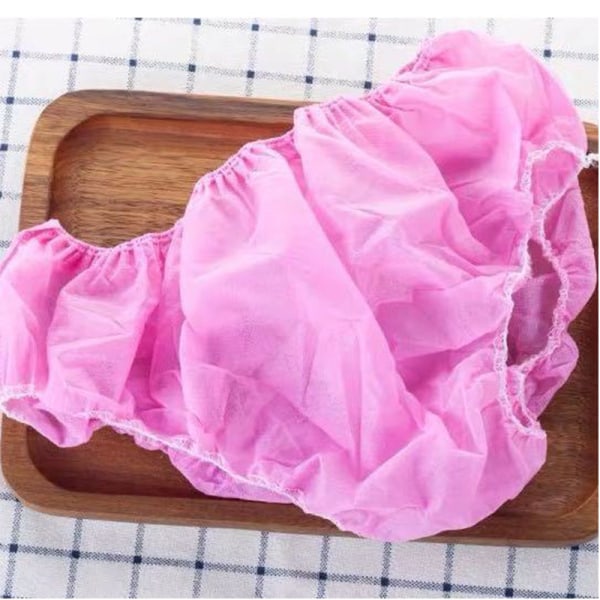 【Tricor butik】 Aseptiska engångsbyxor för individuella förpackningar ovävda lämpade för skönhetsspa sweatshop bastu män och kvinnor andas Pink 100PCS