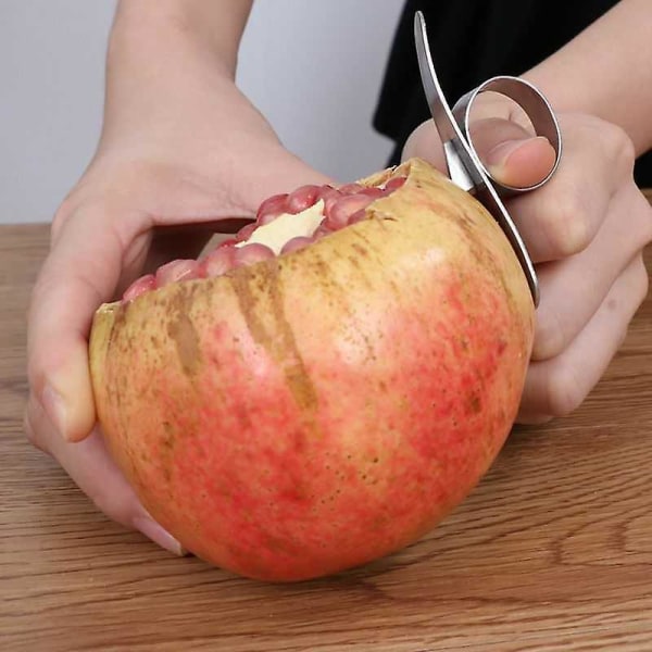 Kannettava pieni sormusoranssinkuorija ruostumattomasta teräksestä appelsiininavaaja Finger Snai
